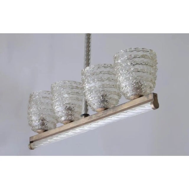 Beautiful Murano glass ceiling light attributed to Ercole Barovier. Made by hand in Murano, Italy circa 1950. This light...