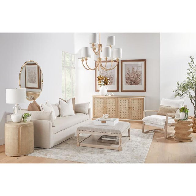 The Performance White Boucle Sling Hamlin Club Chair delivers refined comfort through solid oak craftsmanship and high-...