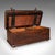 This is an antique flower press box. An English, beech and cast iron hobby case dating to the Edwardian period, circa...