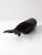 This vintage ironwood whale sculpture features a smooth, minimalist design with sleek lines and a deep, rich tone. The...