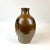This brown ceramic Japanese jug is from the edo period (1603 -1868) and was likely used as a wine jug. The pictures are...