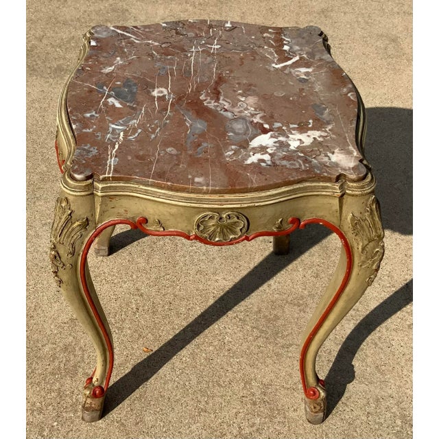 Nice vintage poly chrome French side table or drink table with a marble top and cabriole carved legs