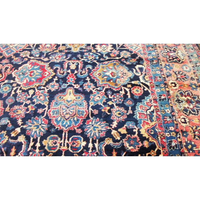 This exceptional antique Persian Laver Kerman carpet is a magnificent palace-size example from the renowned weaving center...