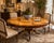 An elegant Georgian style round dining table by Maitland-Smith Furniture￼, showcasing the brand’s celebrated craftsmanship...
