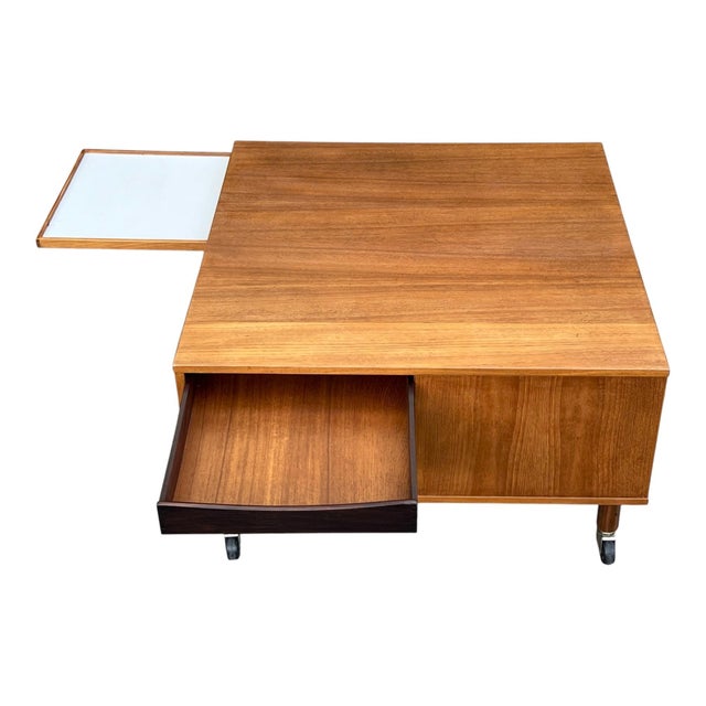 This vintage Danish square coffee table showcases a refined Scandinavian Danish modern design with an emphasis on both...