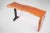 Almost straight cut top and living edge legs, this contemporary console table displays a clean, graceful, modernist...