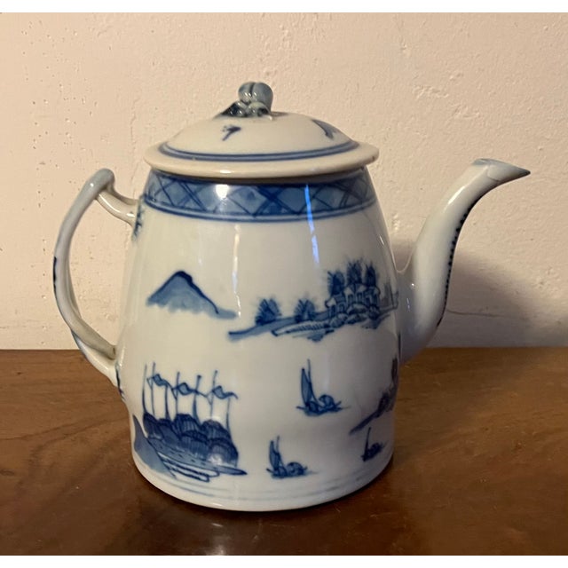Antique 19th century Chinese export blue & white porcelain Canton teapot. Decorated with a continuous harbor landscape...