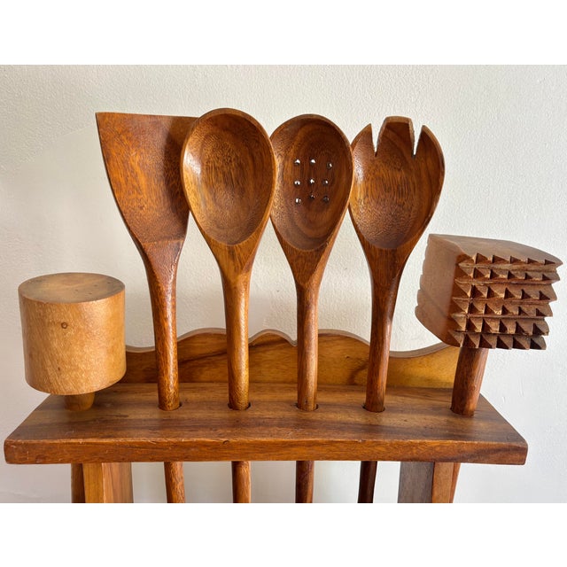 Hand-crafted utensil set on stand with 9 pieces, including a cutting board, rolling pin, and a meat mallet. Beautifully...