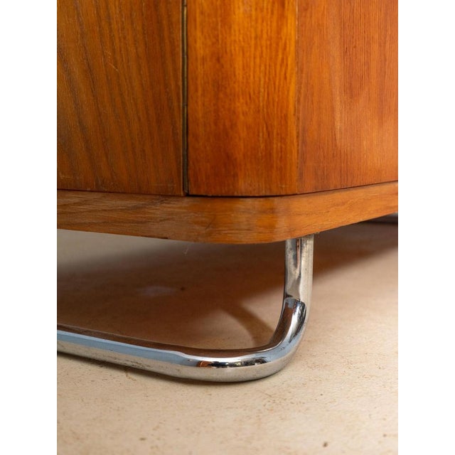 This clothes cabinet was designed by Vichr & spol. in the 1930s and later manufactured by Kovona in the 1950s in the...