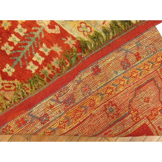 An early 20th century colorful palace size full pile condition antique Turkish Oushak rug. The texture and full pile...