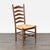 Italian-made chair with rush seat. Brand: Pottery Barn. Dimensions (in): 20W x 21D x 43H.