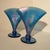 An exceptional matched pair of vintage Fenton art glass fan vases in the iconic Celeste Blue Stretch colorway. Crafted...