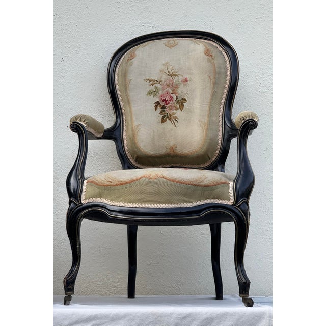 lovely pair of antique French fauteuils, Napoleon III w/ ebony finish in excellent condition. very comfortable medium...