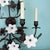 Vintage 7 Light Wrought Iron Wall Sconce With Milk Glass Flowers & Cherub Motif - Matching Sconce Available Separately For Sale - Image 9 of 12