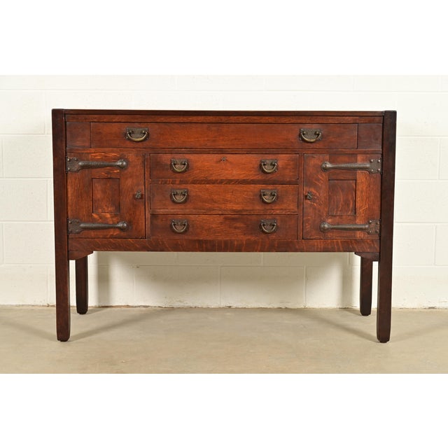 An exceptional antique Mission or Arts & Crafts period strap hinge sideboard, buffet server, or bar cabinet By Stickley...