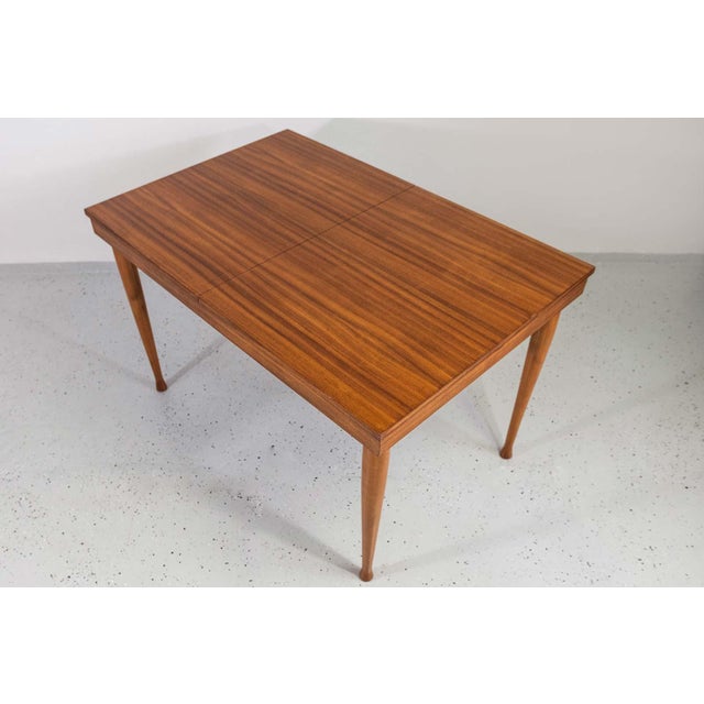 Dining Table by Marian Grabiński, Krakowskie Fabryki Mebli, Poland, 1960s This dining table has been fully restored to...