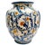 A striking vintage Italian Majolica vase featuring a bold heraldic shield, vibrant hand-painted scrollwork, and classic...