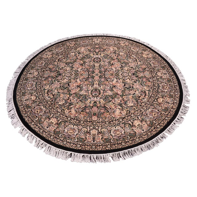 This hand‑knotted Pak Persian round rug showcases the finest expression of traditional Persian artistry. Each piece is...
