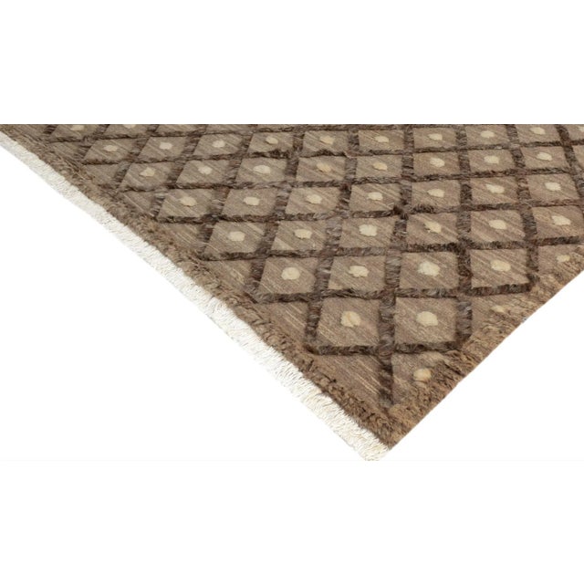 Make a statement in your home with this meticulously hand-knotted high-low pile Moroccan wool rug. An intricate design...
