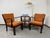 Pair of Thonet Mundus armchairs professionally stained and repolished with new terracotta fabric. This piece is attributed...