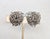 1960s rhodium plated domed ferns clip back earrings. Marked "Napier." Measure: 1 inch long by 1 1/8 inches wide. Excellent...