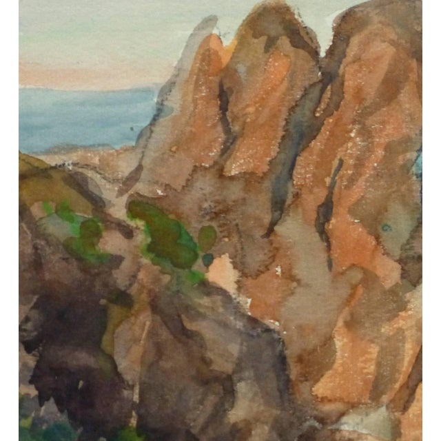 Richly hued watercolor landscape of a breathtaking scene from Cap Dramont, a nature preserve near the French Riviera by M....