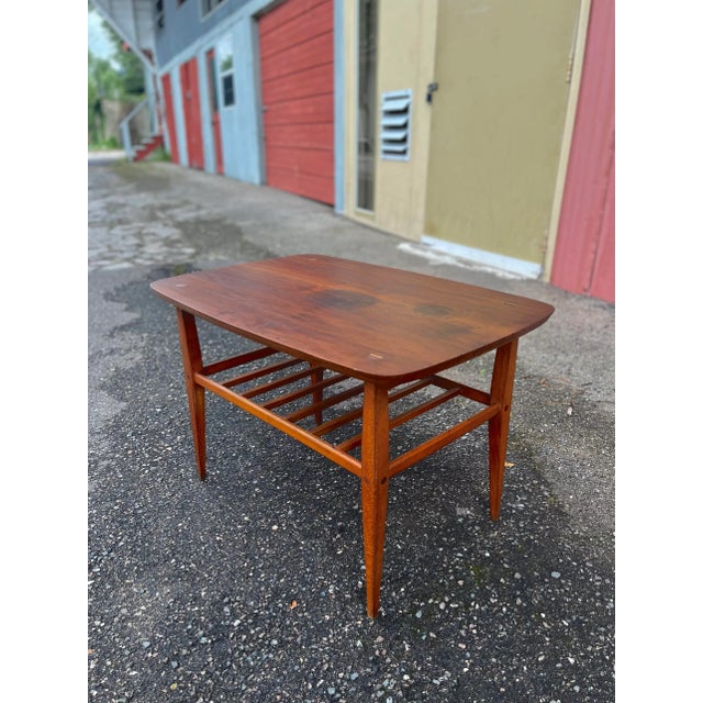 Lane Rounded Rectangular Side Table With Slatted Bottom Shelf. Really sweet and clean lines on this series. The best part...