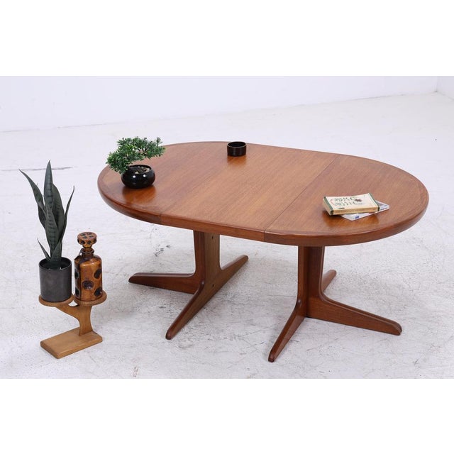A beautiful extendable coffee table in Scandinavian style with clean proportions and a warm teak wood look. The removable...