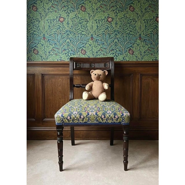 Elevate your space with this exquisite 19th-century English Regency side chair, meticulously restored using traditional...
