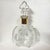 An authentic Louis XIII Rémy Martin Baccarat crystal decanter featuring the original handcrafted crystal stopper and...