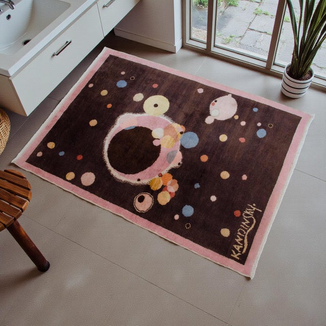 This small Kandinsky- Several Circles- inspired rug was hand-knotted in a quality Jaipur workshop in India in the 1990s,...