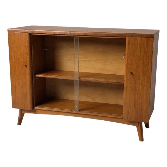 Mid-Century Drinks Cabinet in Teak with Glass Sliding Doors and Adjustable Shelf For Sale