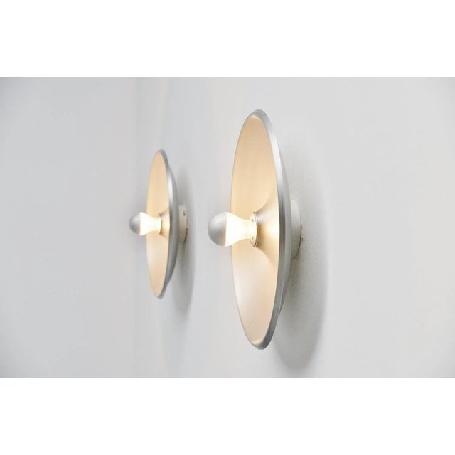 Fantastic pair of large wall/ceiling lamps model 262 designed by Gino Sarfatti, Italy 1971. This pair of wall lamps has an...