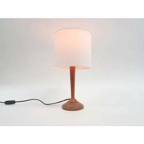 Small bamboo table light with new wiring and a new lamp shade. Up to 250V (Europe/UK Standard).The wiring of this item may...