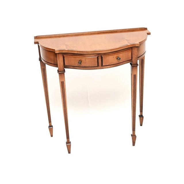 A beautiful and elegant antique Georgian style yew wood console table. This was made in England, it dates from around the...