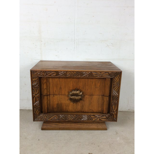 This mod century modern nightstand features hardwood construction, original oak finish, two dovetailed drawers with unique...