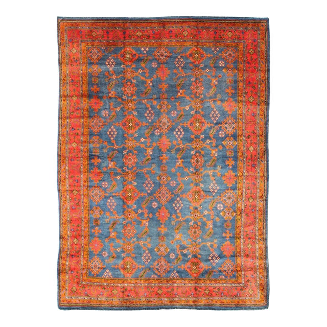 Early 20th Century Antique Turkish Oushak Rug in Vibrant Blue Red Green With All-Over Design For Sale