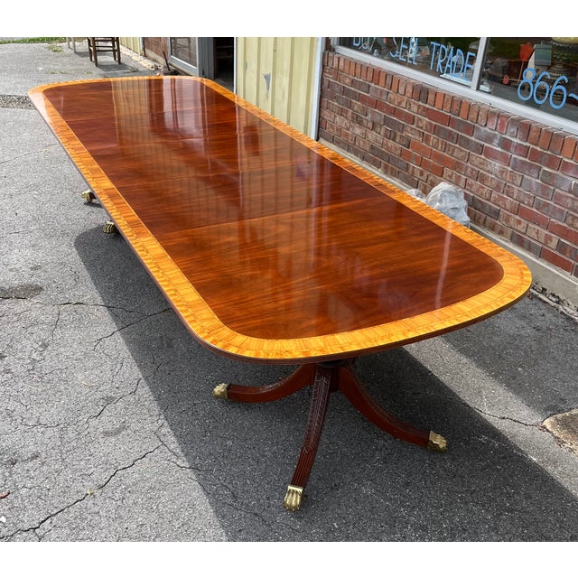 Beautiful Georgian Regency style double pedestal extension dining table by premier American maker Councill Craftsmen....