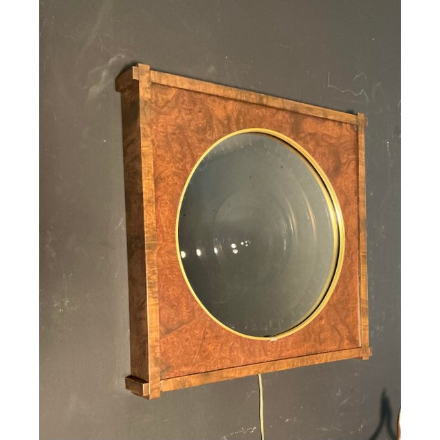 Mid Century Modern infinity wall mirror. Features a 16" round 3-D bullseye light illusion effect when turned on, and sits...