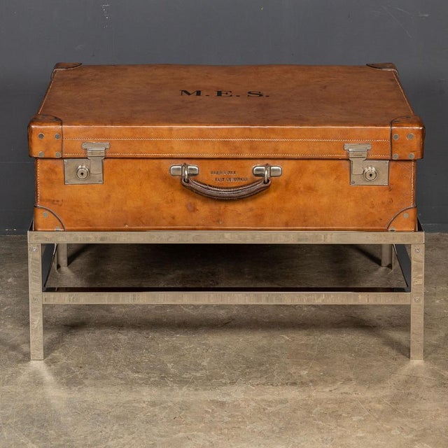 Antique early 20th century trunk on stand, the inside is lined fabric in a rich burgundy colour, beautifully offsetting...
