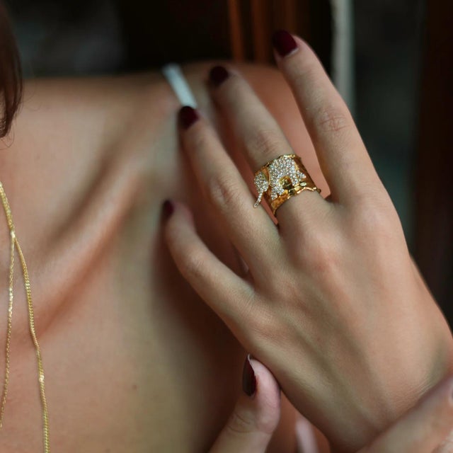 Guardian Diamond Elephant Gold Chunky Adjustable Ring, a luxurious and protective piece designed to bring both good...