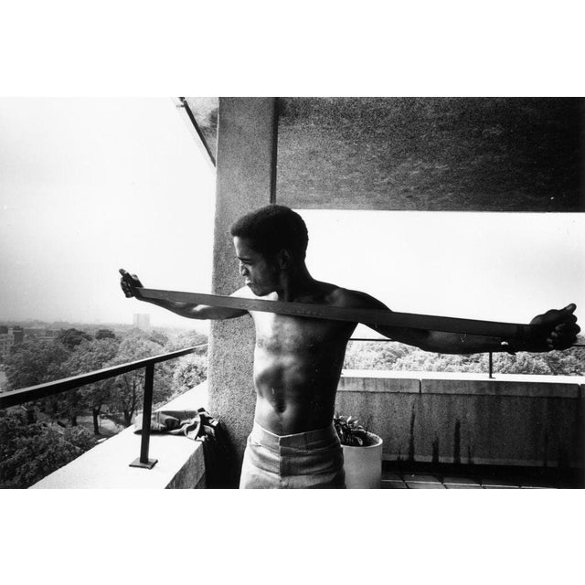 Sammy Stretches June 1968: American actor, singer and dancer Sammy Davis Jnr (1925 - 1990) keeping in trim with an elastic...