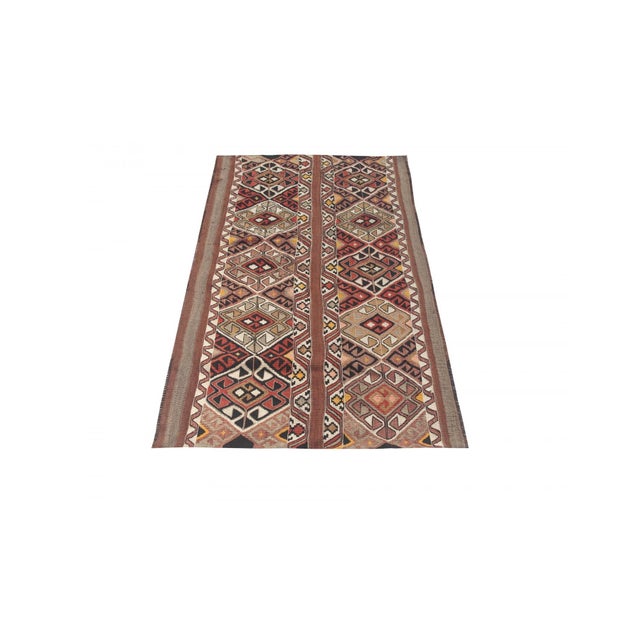 Vintage handwoven decorative kilim rug from Kars region of Turkey. Approximately 50-60 years old. In very good condition.