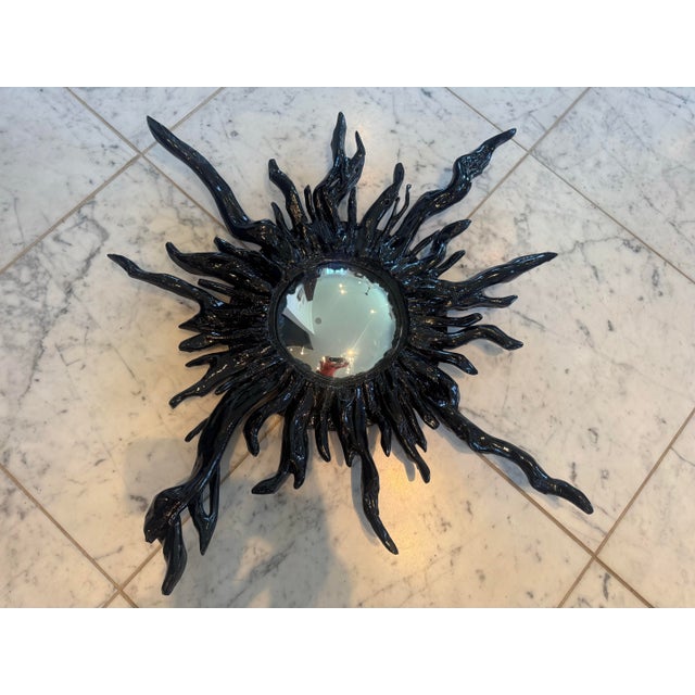 Unique naturalistic console and sunburst convex mirror in black lacquer. Designed by New York designers Dransfield & Ross,...