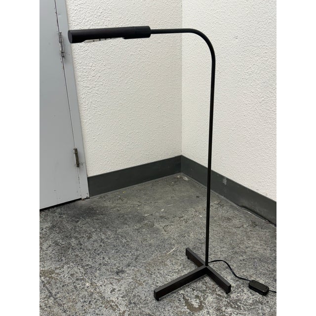 Design Plus Gallery presents the Model 5102 Accent Floor Lamp from Phoenix Day. The lamp has a slender metal frame with a...