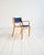Bent beech wood chair with armrests. Original electric blue upholstery. Magnus Olesen label present. Produced by Magnus...