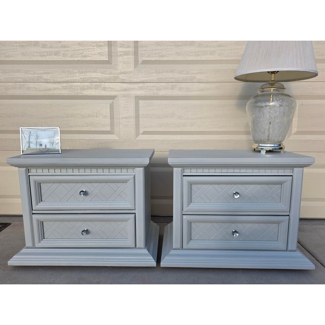 Refinished and modernized matching nightstand set. Soft light gray/off-white finish, elegant molded trim, diamond-pattern...