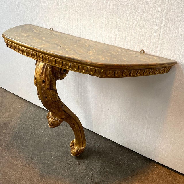 DETAILS An antique hanging console table, display shelf supported on a single cabriole leg. STYLE French Louis XVI style...