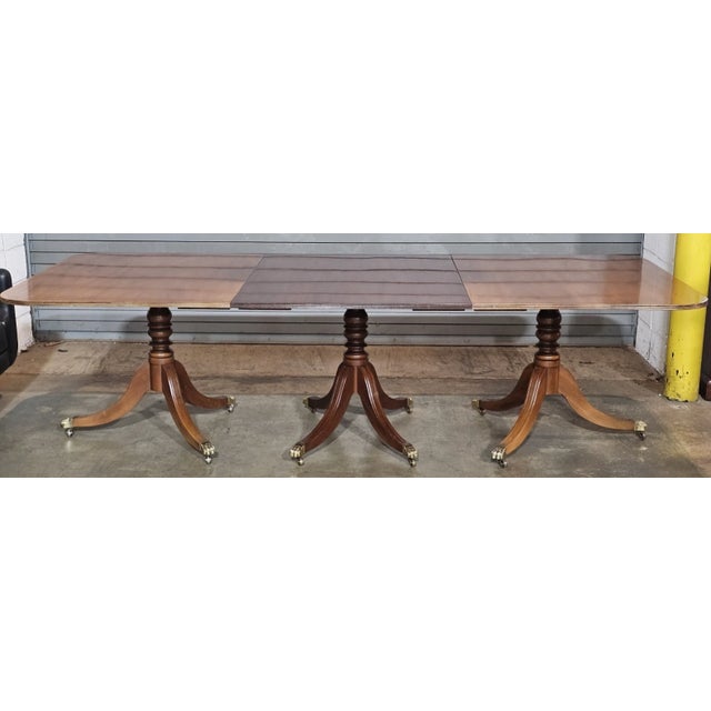 Store Item: Kittinger Williamsburg Mahogany Three Part Pedestal Dining Room Table WA 1043 & WA 1044 Description: Inspired...