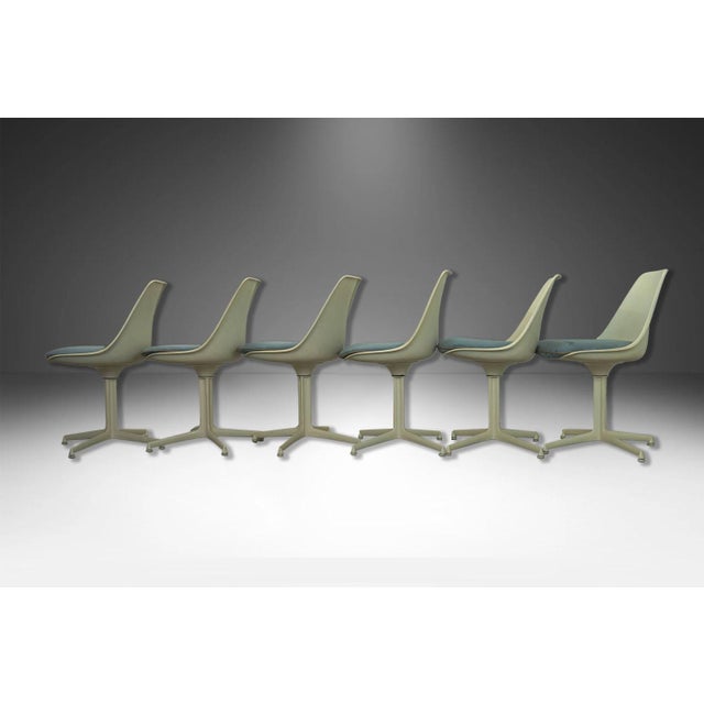 This set of six mid-century modern armless, side, dining chairs, manufactured by Burke reflect the strong influence of the...